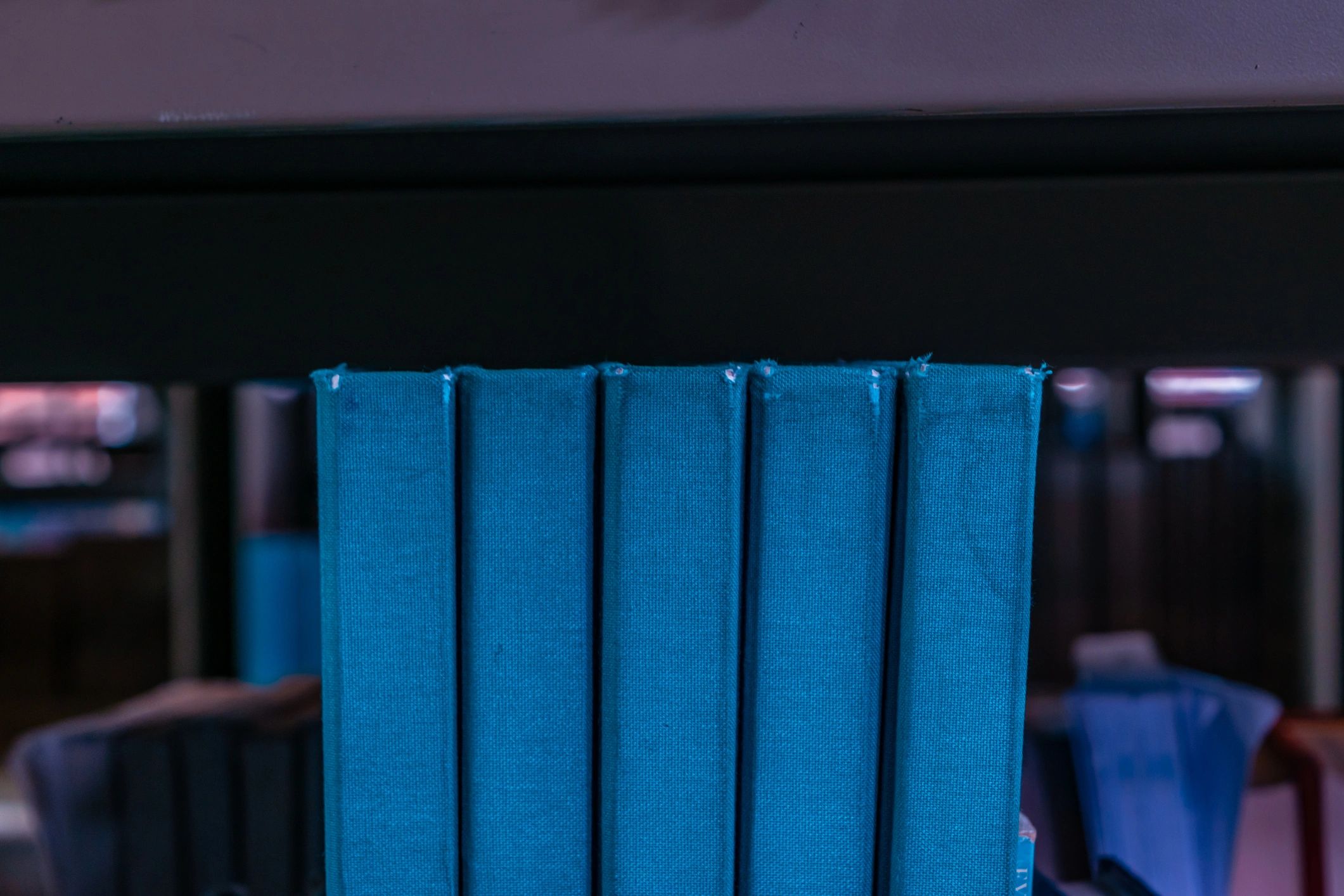 Close-up of stacked books and paper textures for printable writing tools