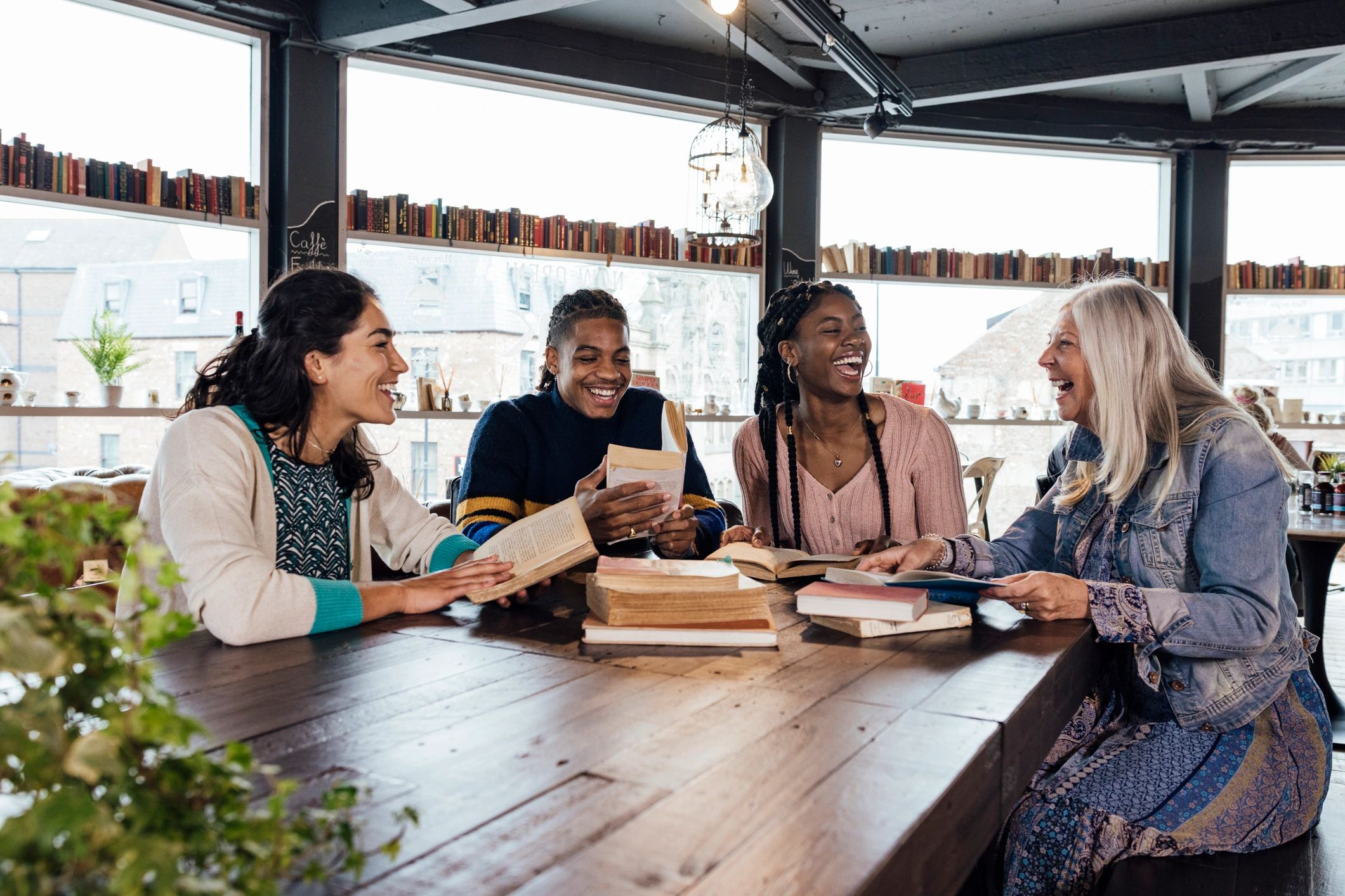 Book club style community gathering with writers in conversation