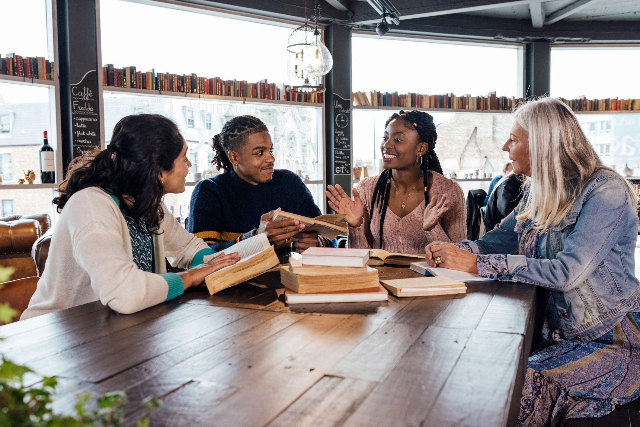 Attendee engaged in a cozy writers group conversation