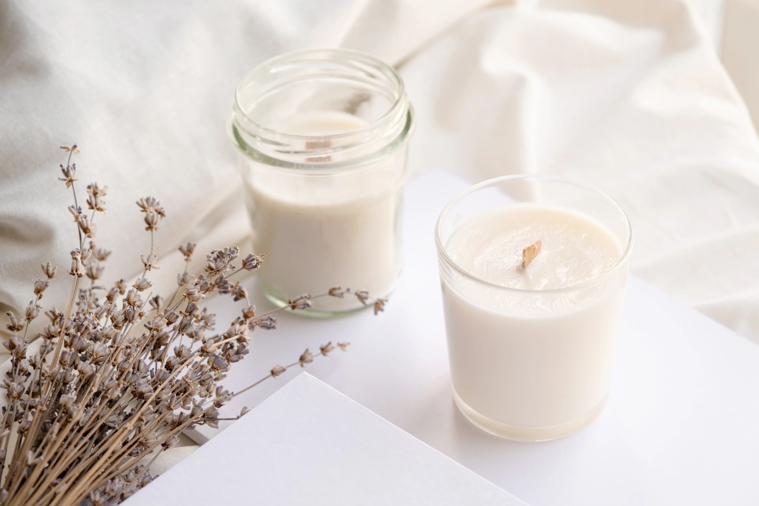 Vintage-inspired candle and lavender styled for a cozy poetry writing mood