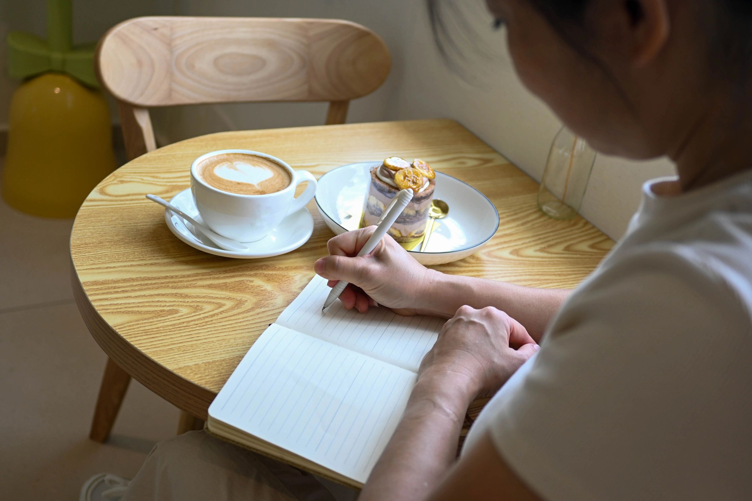 Writer taking notes during a focused learning session